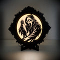 The Haunted Portrait - Ornate Gothic Ghost Face Illuminated Art Frame
