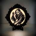 The Haunted Portrait - Ornate Gothic Ghost Face Illuminated Art Frame